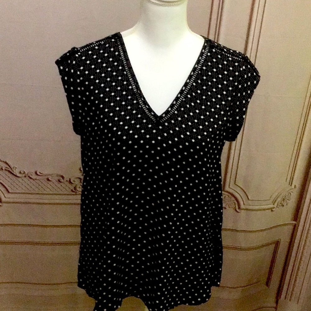 - Sleeveless V-Neck Polka Dot Blouse